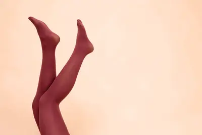  Image showing a woman delicately hand washing her lingerie in a basin, emphasizing the importance of gentle care and attention to detail in maintaining intimate apparel